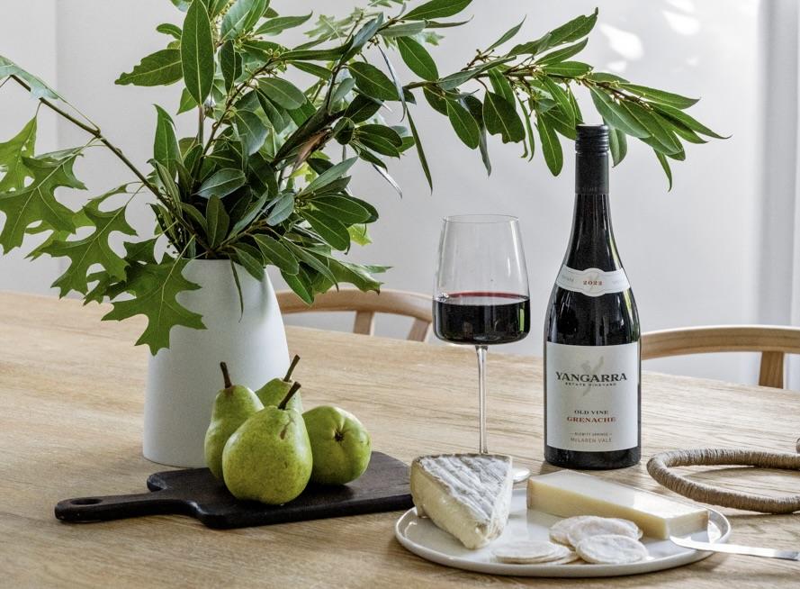 A beautiful bottle of Yangarra red wine with a delicious cheese plate and pears ready for sharing.