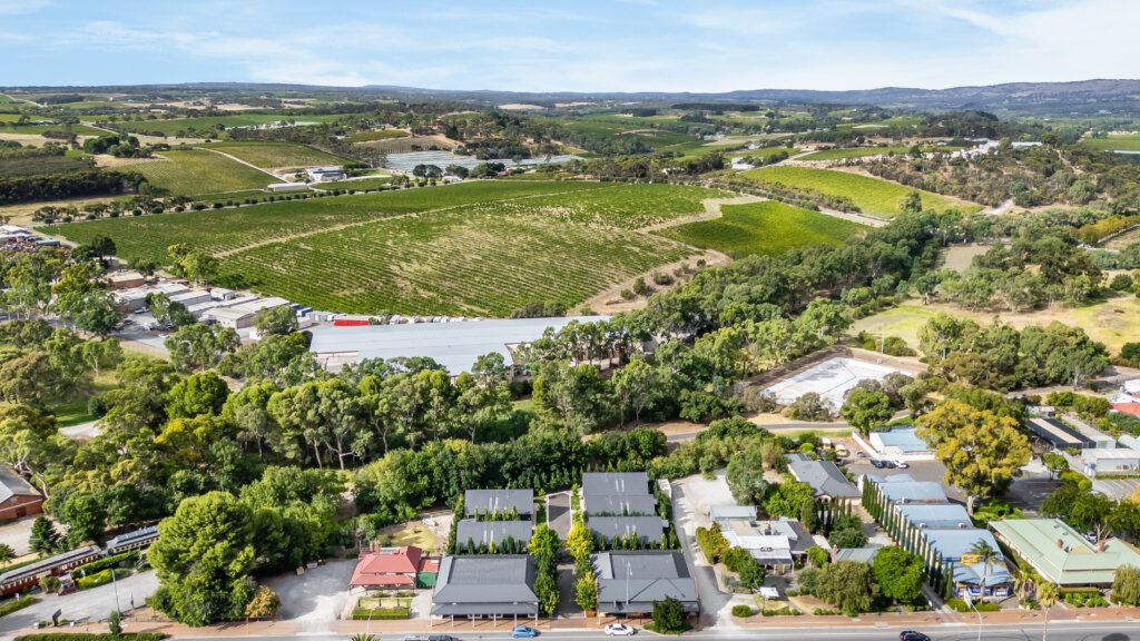 Vale 194 in foreground in the middle of the McLaren Vale Main Street with vineyards in the distance