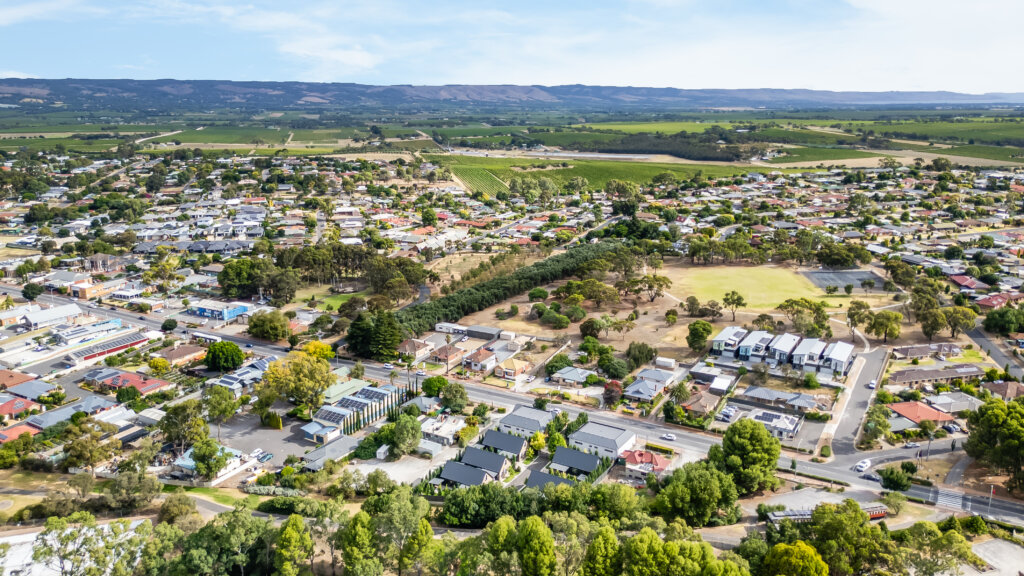 Vale 194 in foreground in the middle of the McLaren Vale Main Street with vineyards and hills in the distance