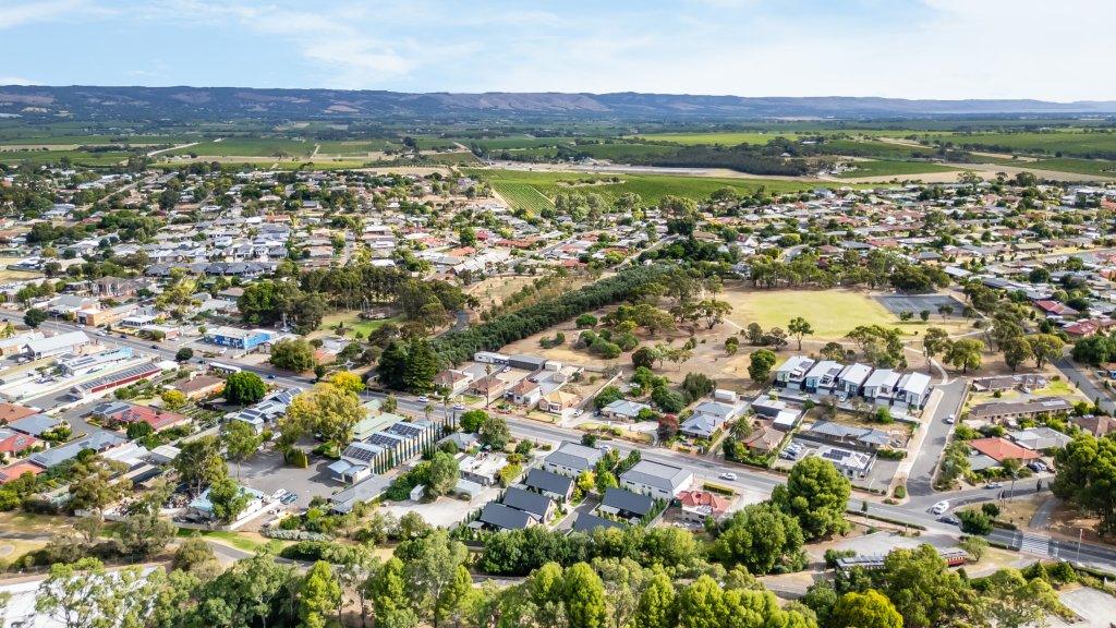 Accommodation in McLaren Vale at Vale 194 Vale 194 in foreground in the middle of the McLaren Vale Main Street with vineyards and hills in the distance