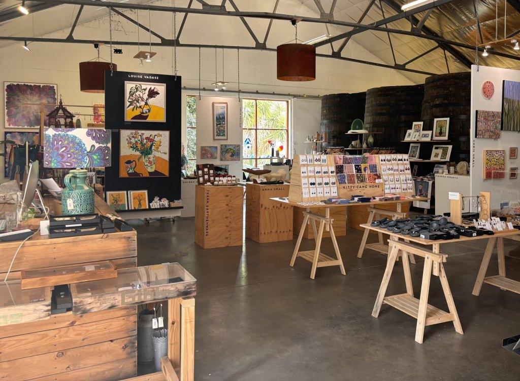 Fleurieu Art House in McLaren Vale shop with tables of art and paintings