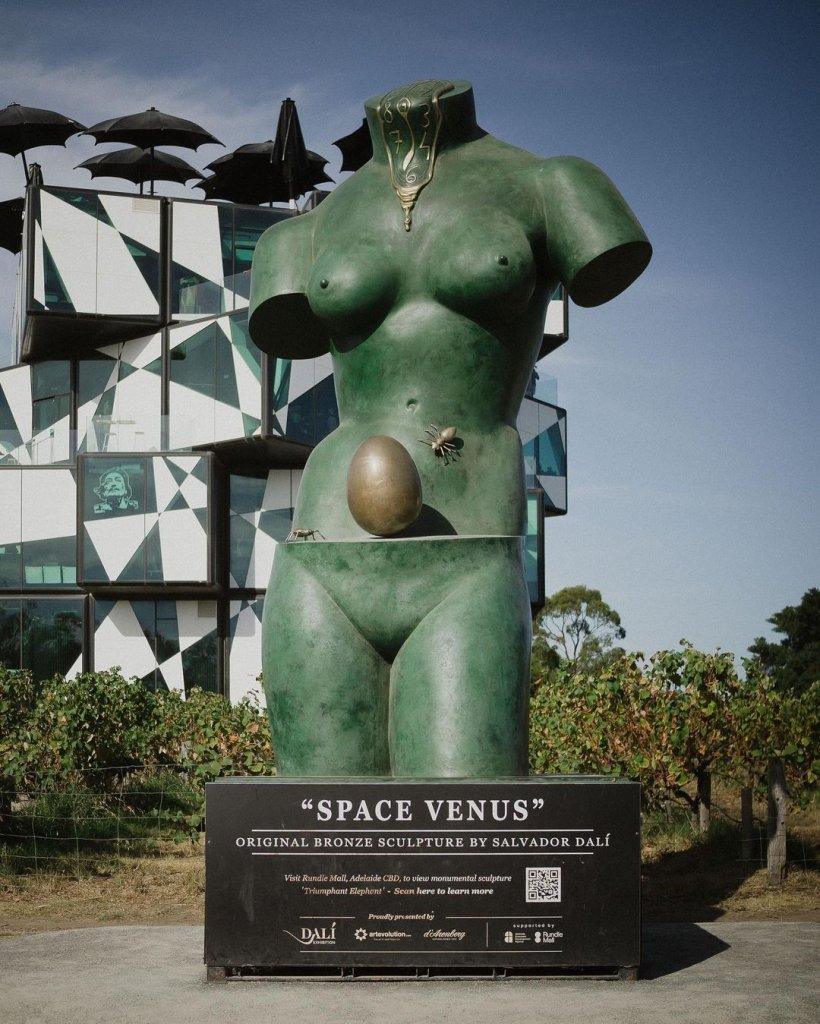 Salvador Dali Exhibition "Space Venus" sculpture in front of vines and the d'Arenberg Cube in McLaren Vale