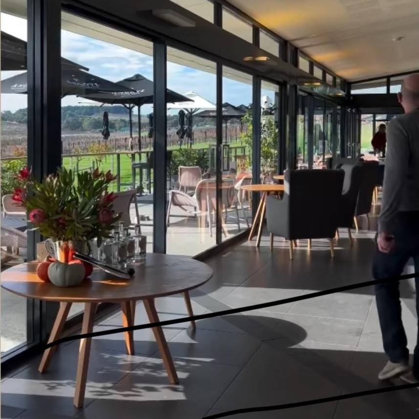 Angove Winery and Restaurant are with set tables and views to vineyards