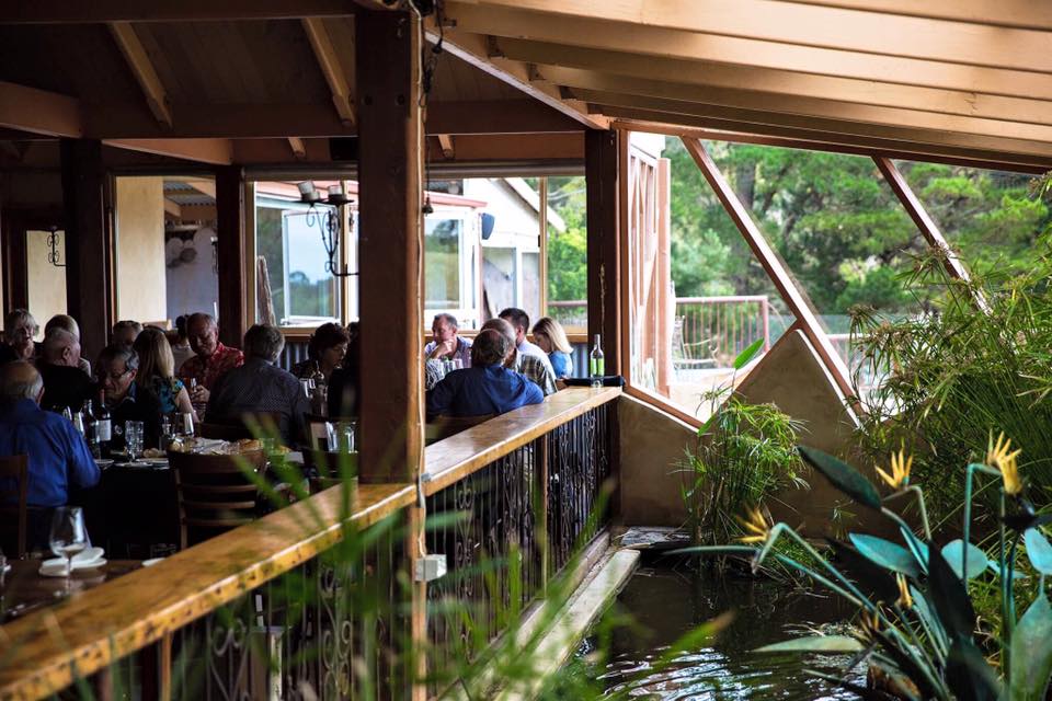 Our Place Willunga under cover dining space with indoor pond and dining tables