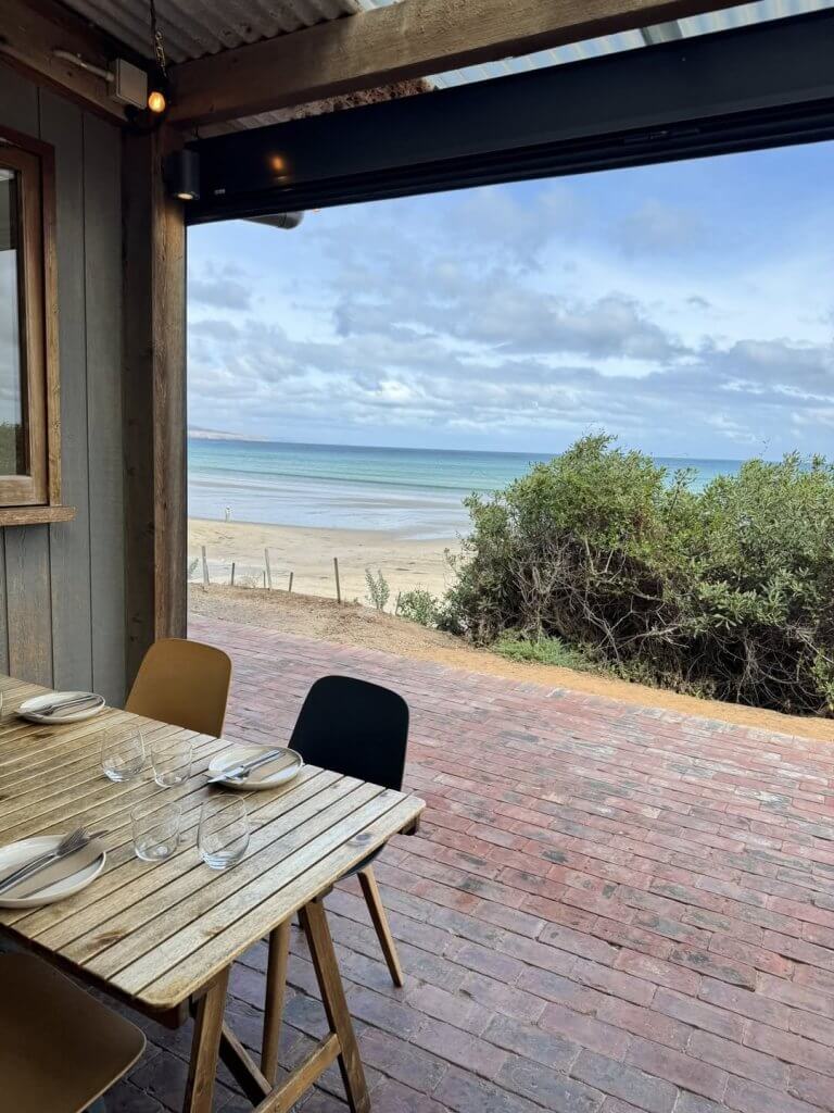 Pearl Aldinga wooden table with views to beach at Aldinga