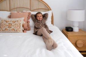 Vale 194 McLaren Vale Family accommodation bedroom cosy with girl relaxingbedroom cosy with girl relaxing